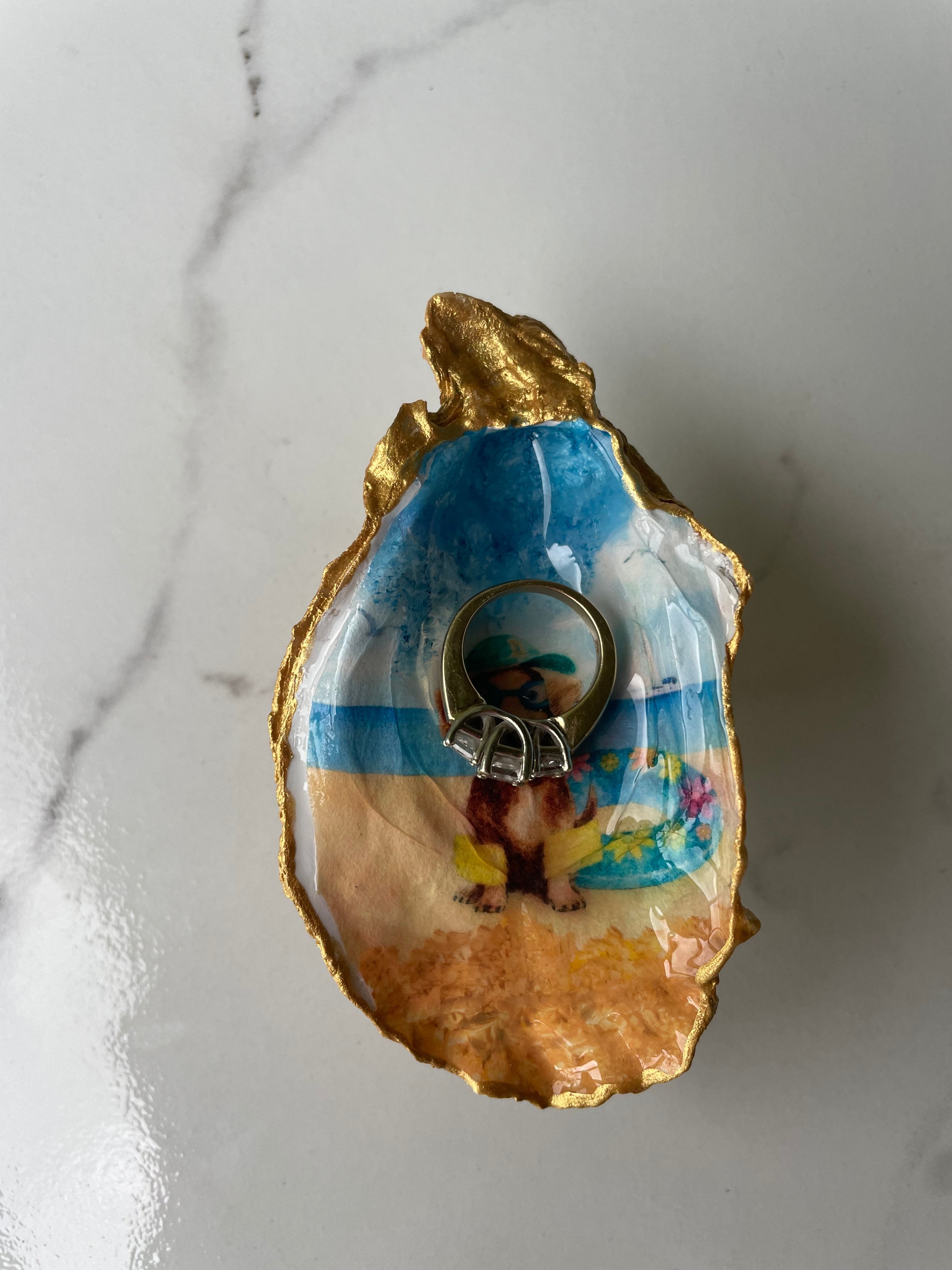 Dachshund Paradise gilded oyster shell trinket dish shown with a ring inside to show size — one-of-a-kind coastal gift for dog lovers