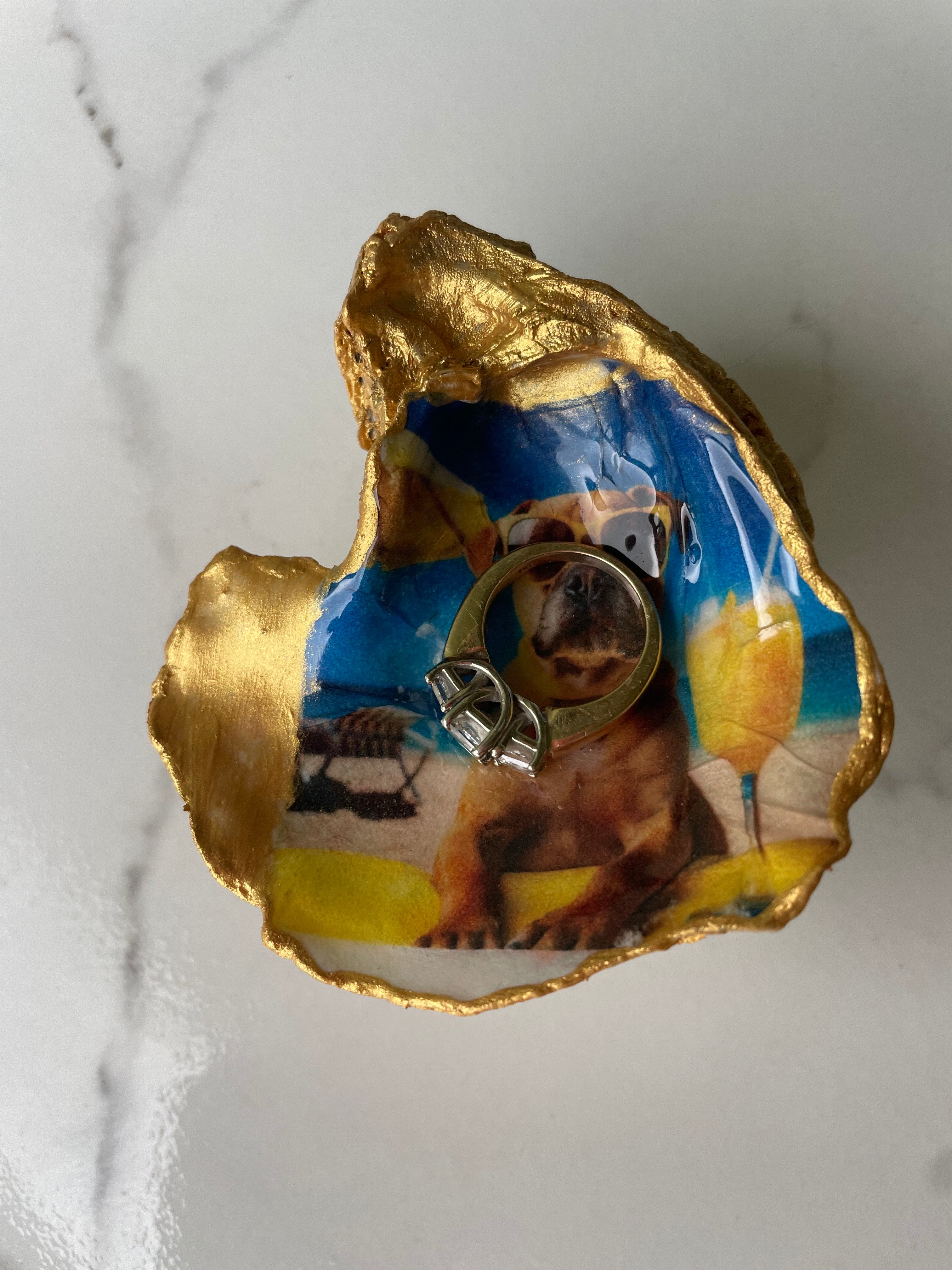 Boxer Paradise gilded oyster shell trinket dish shown with a ring inside to show size — one-of-a-kind coastal gift for dog lovers