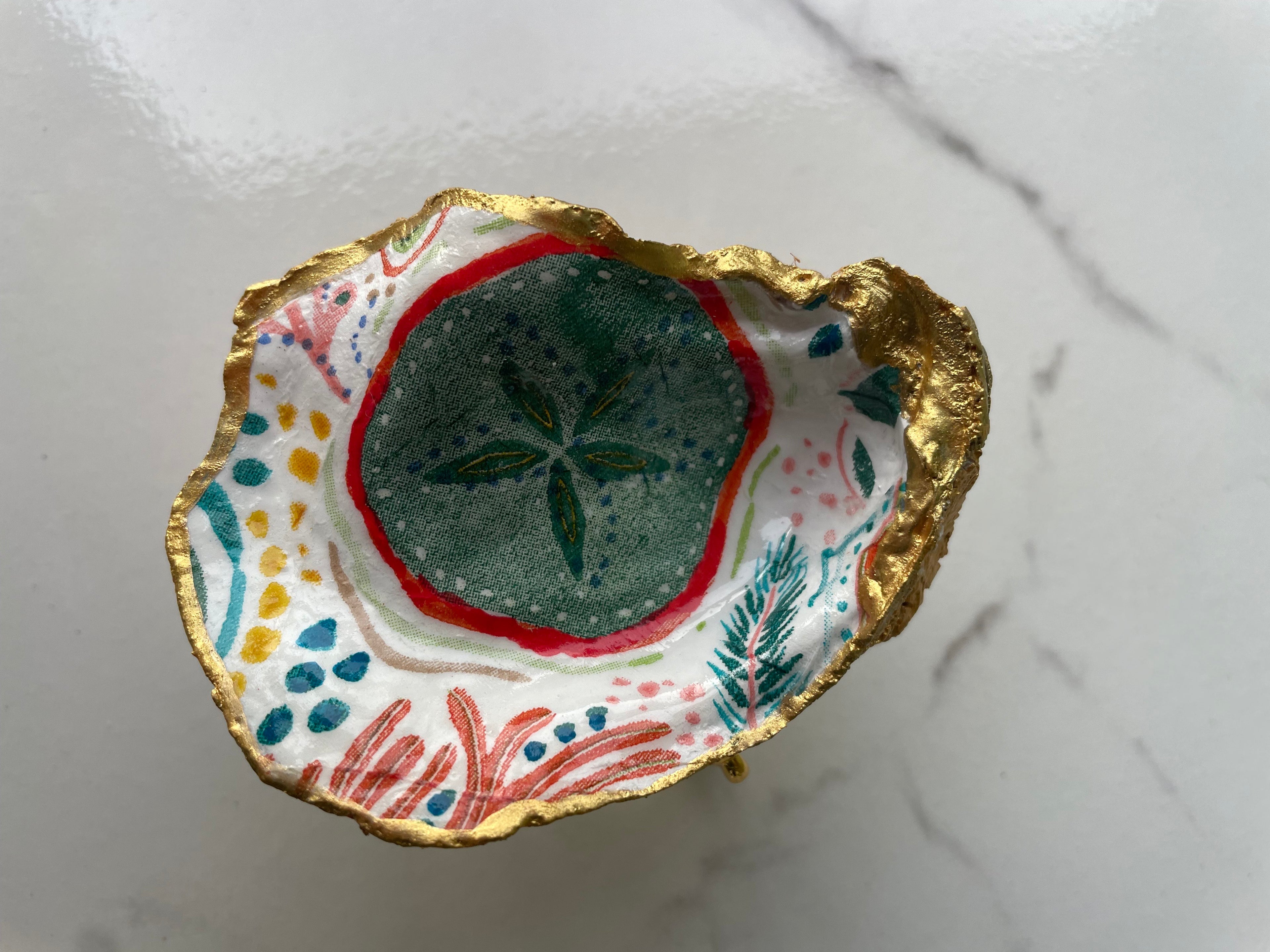 Sand Dollar gilded oyster shell trinket dish with gold paint accent