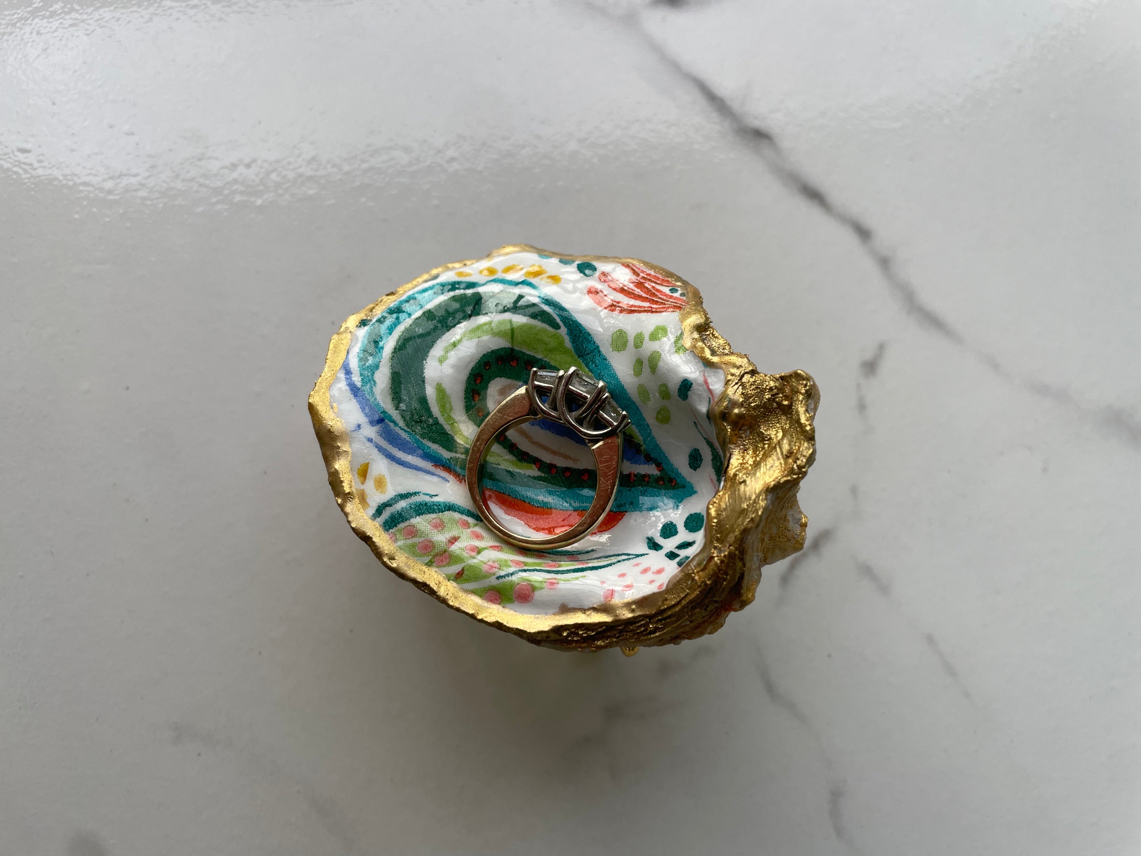 Reef Abstract gilded oyster shell trinket dish shown with ring to display size