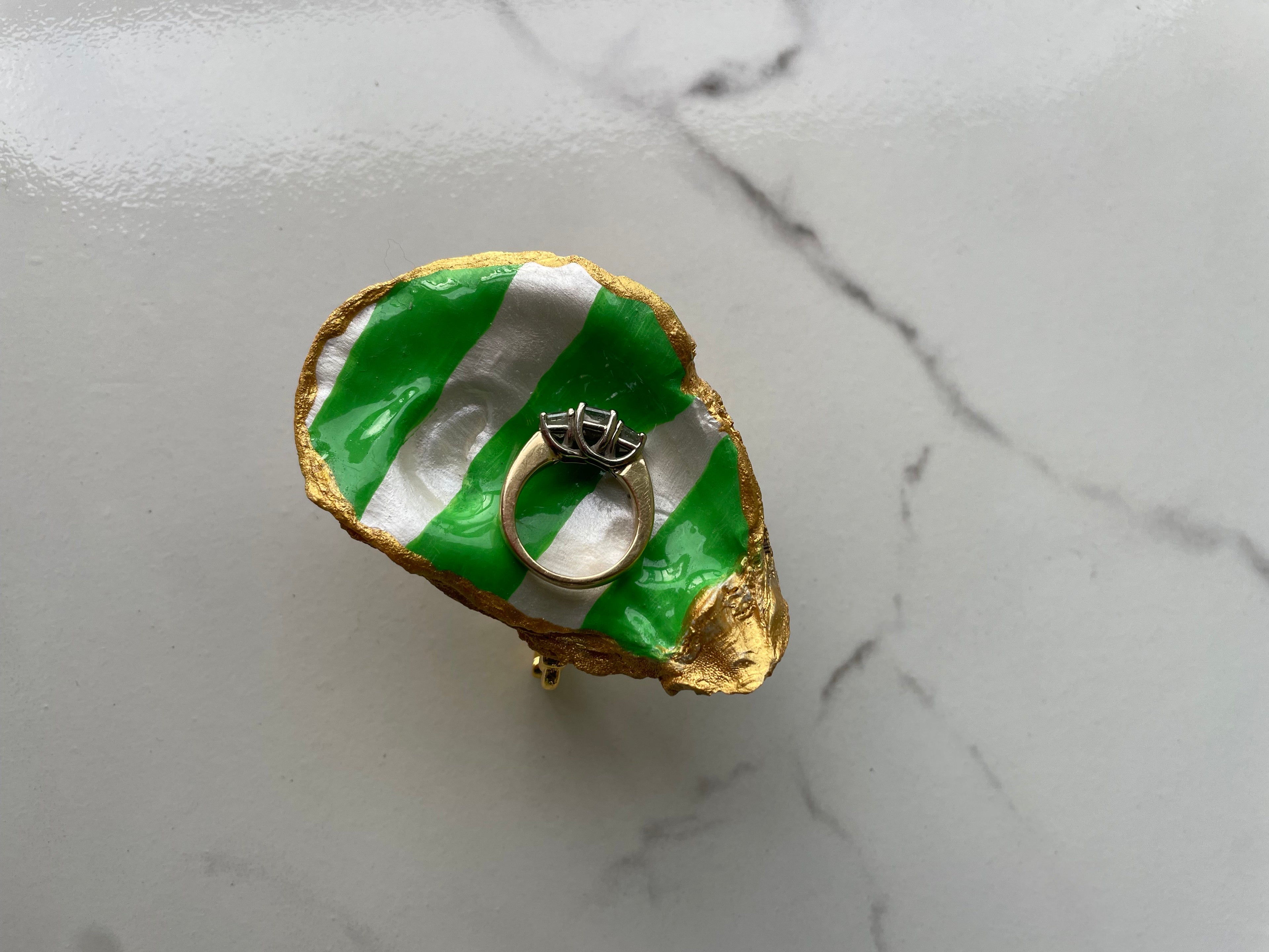 Seaglass gilded oyster shell trinket dish shown with ring to display size