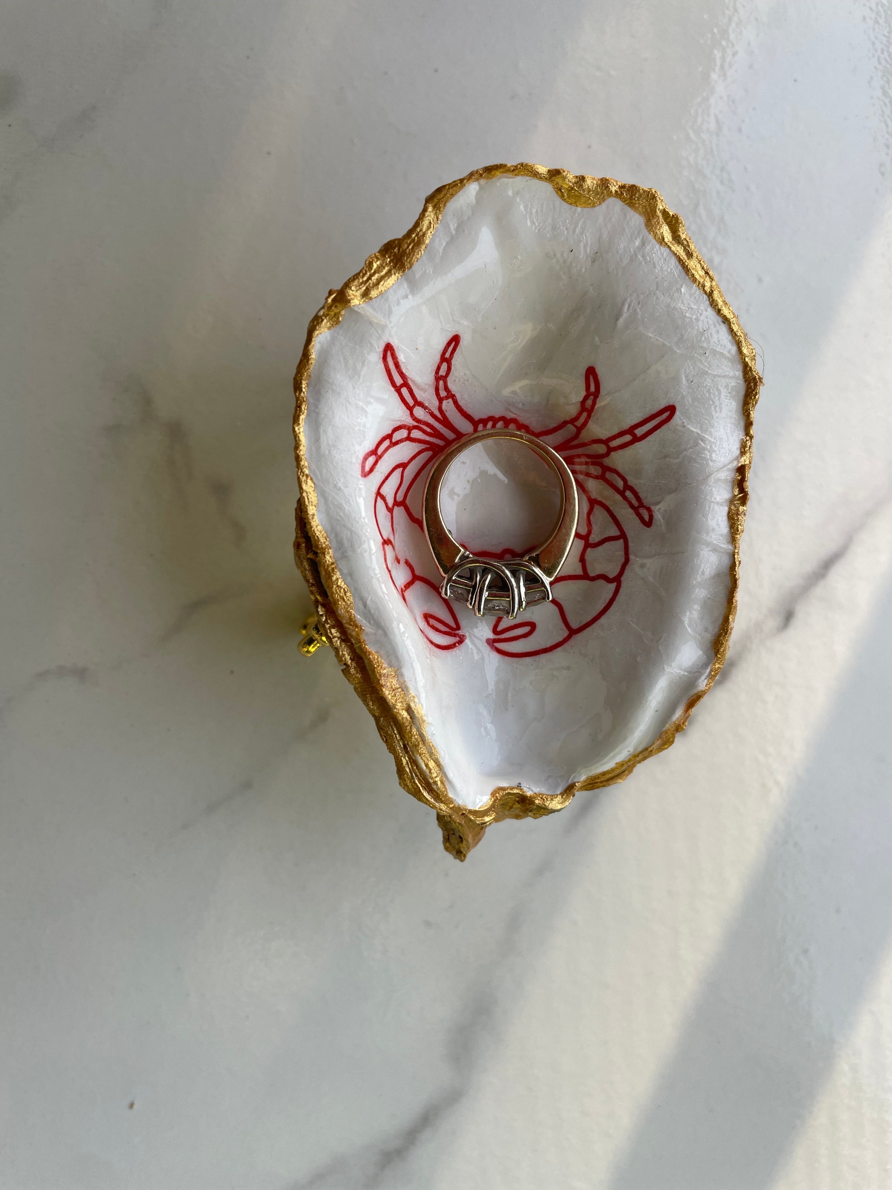 Red Crab gilded oyster shell trinket dish shown with ring to display size