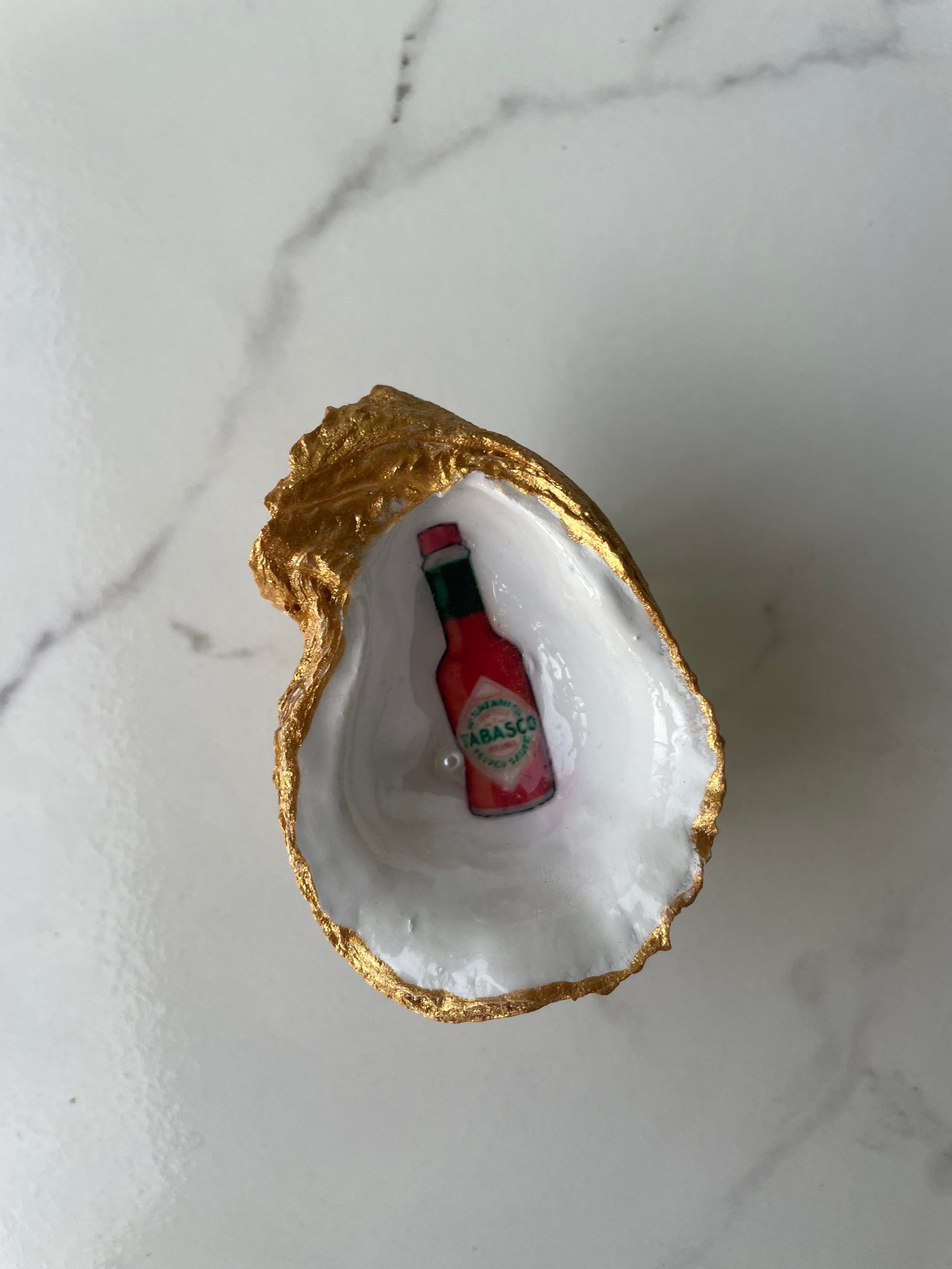 Spicy and Soulful gilded oyster shell trinket dish with gold paint accent