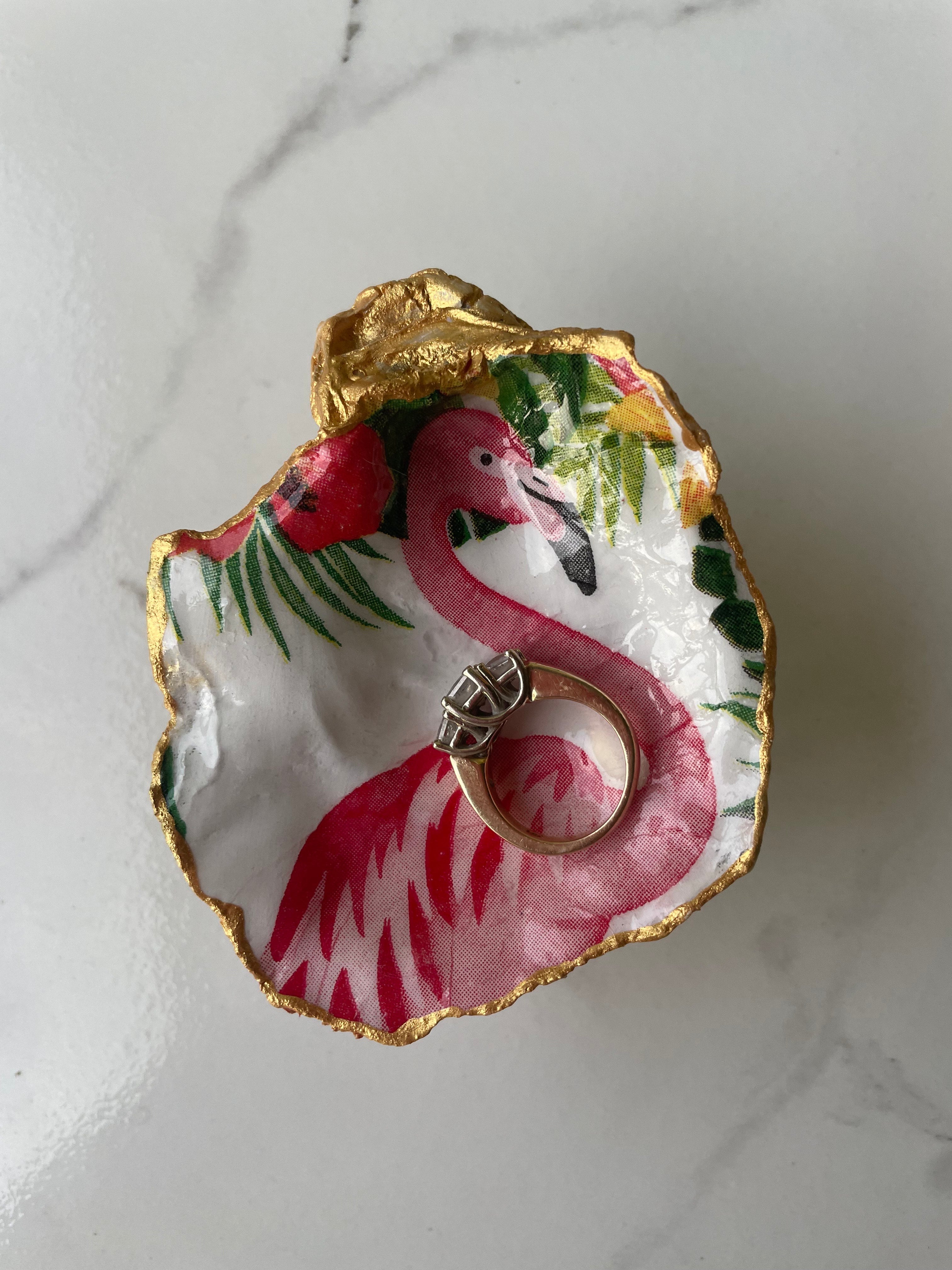 Flaming gilded oyster shell trinket dish shown with ring to display size