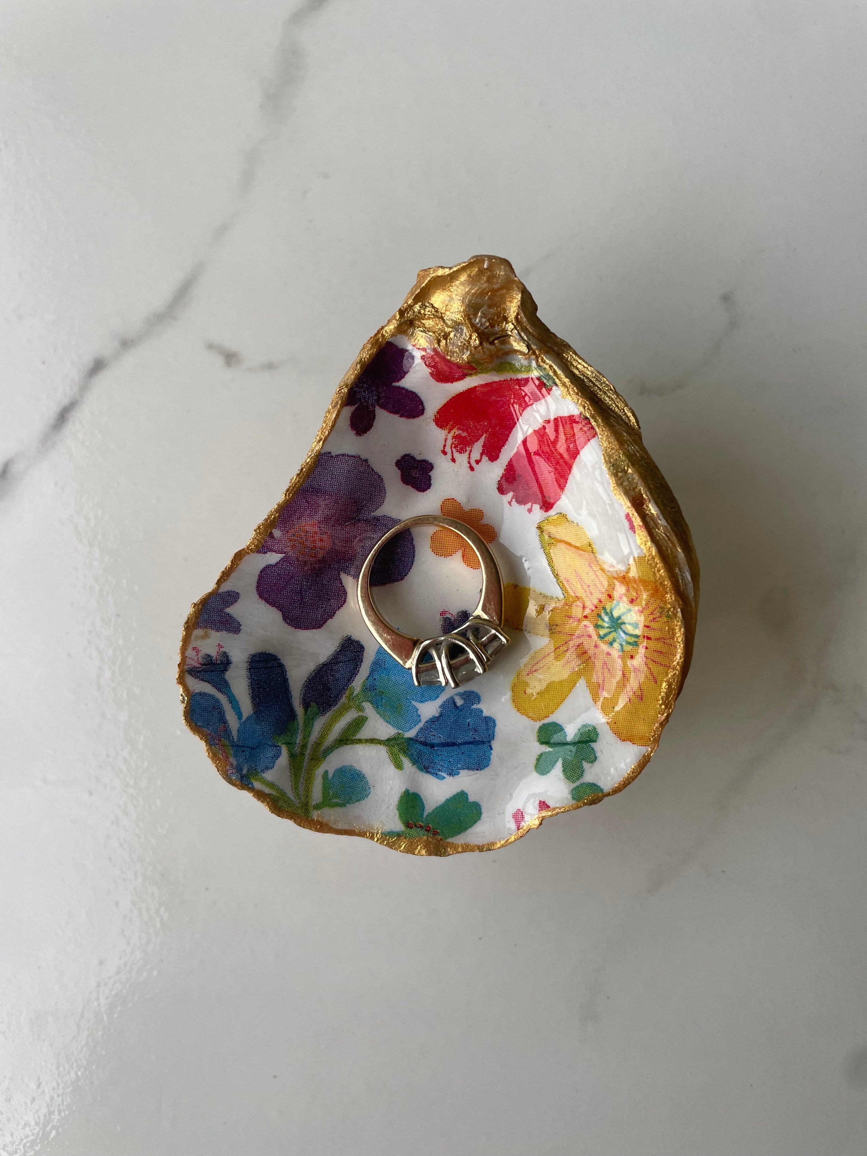 Poppy Fields gilded oyster shell trinket dish shown with ring to display size