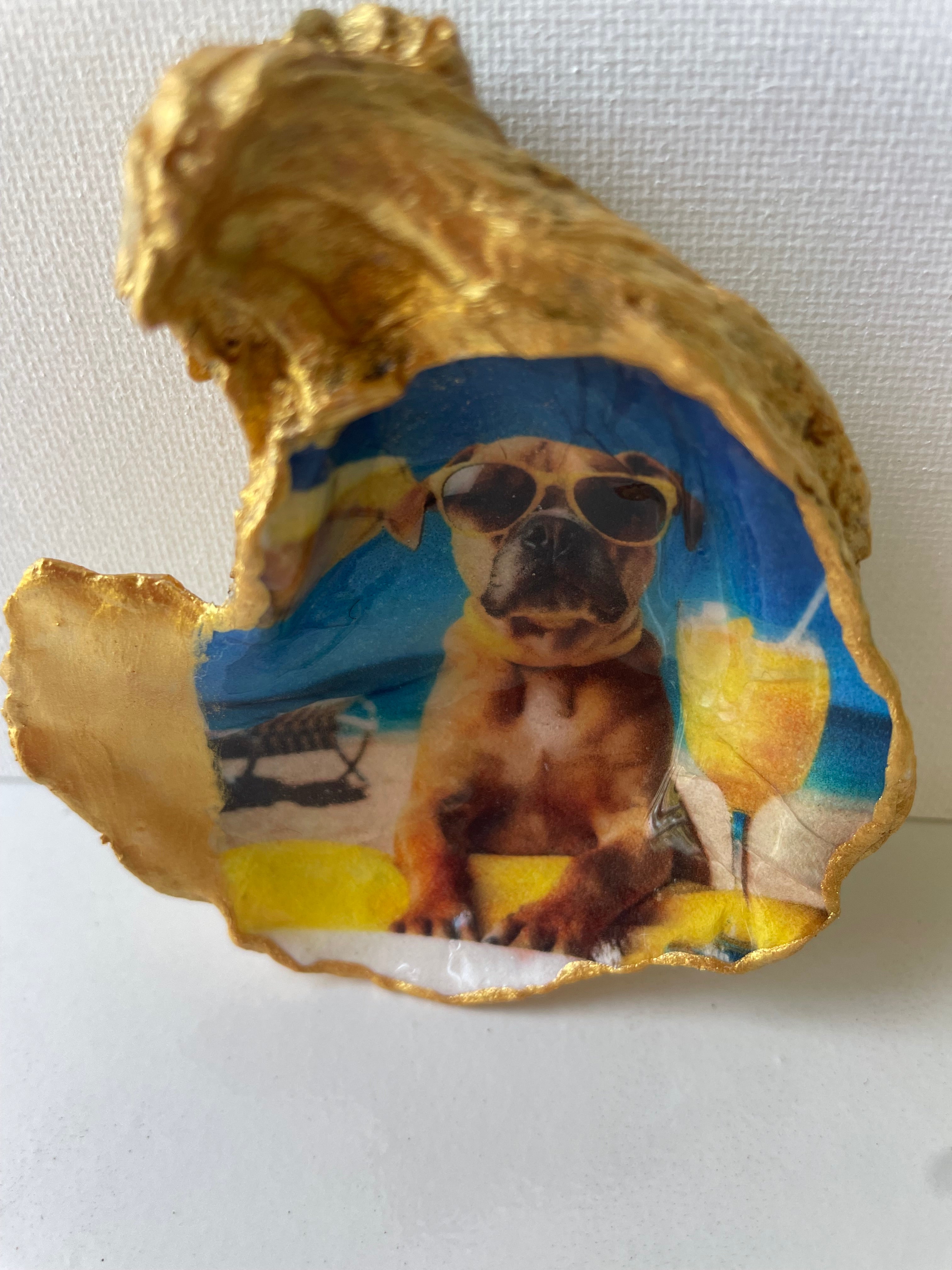 Hero shot of Boxer Paradise gilded oyster shell  dish with gold paint edging.
