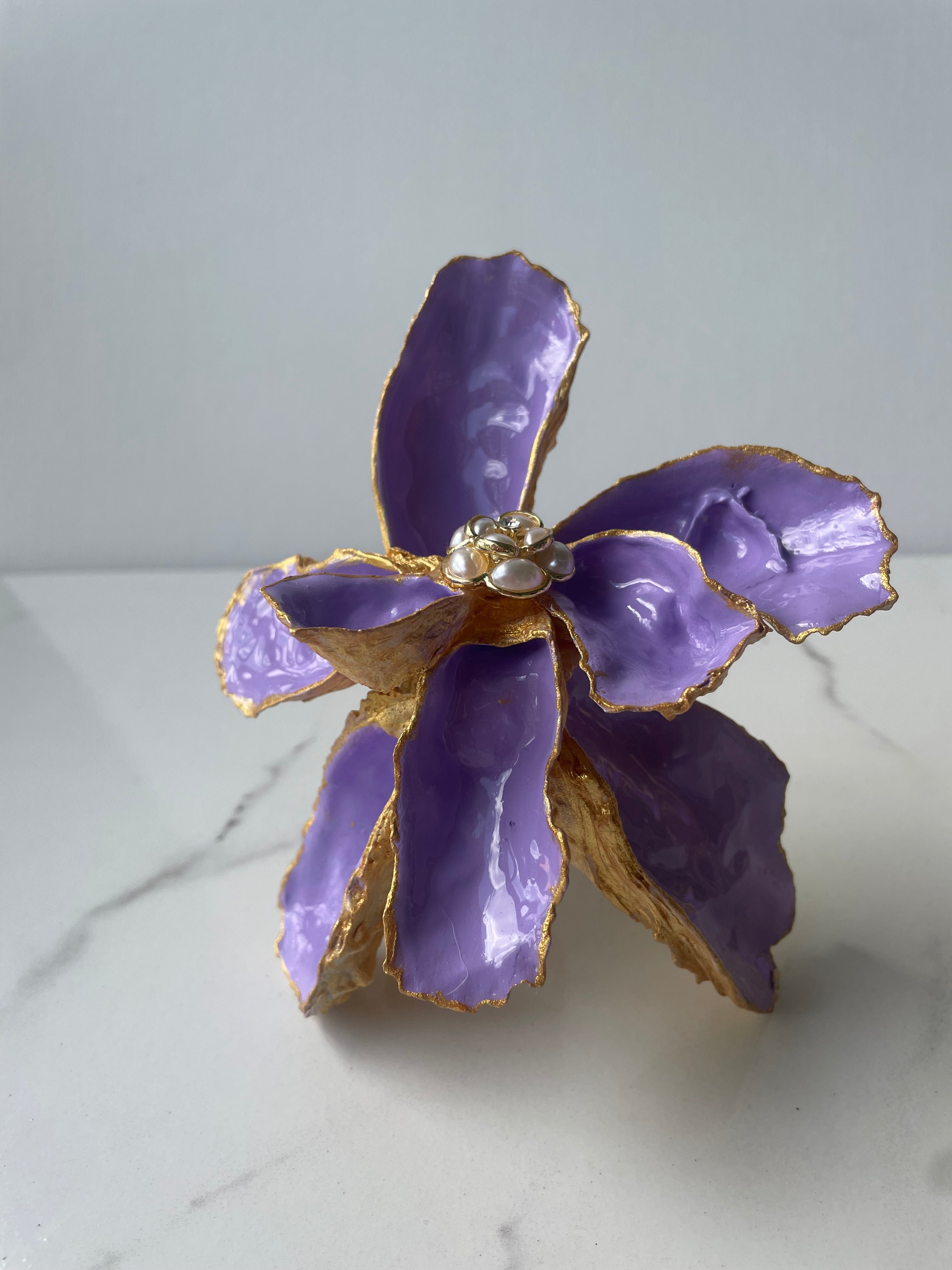 Gilded Iris Shell Flower sculpture #3 — one-of-a-kind coastal shell flower art in violet hues with gold paint edges, approximately 3x4.5 inches by The Golden Shoreline