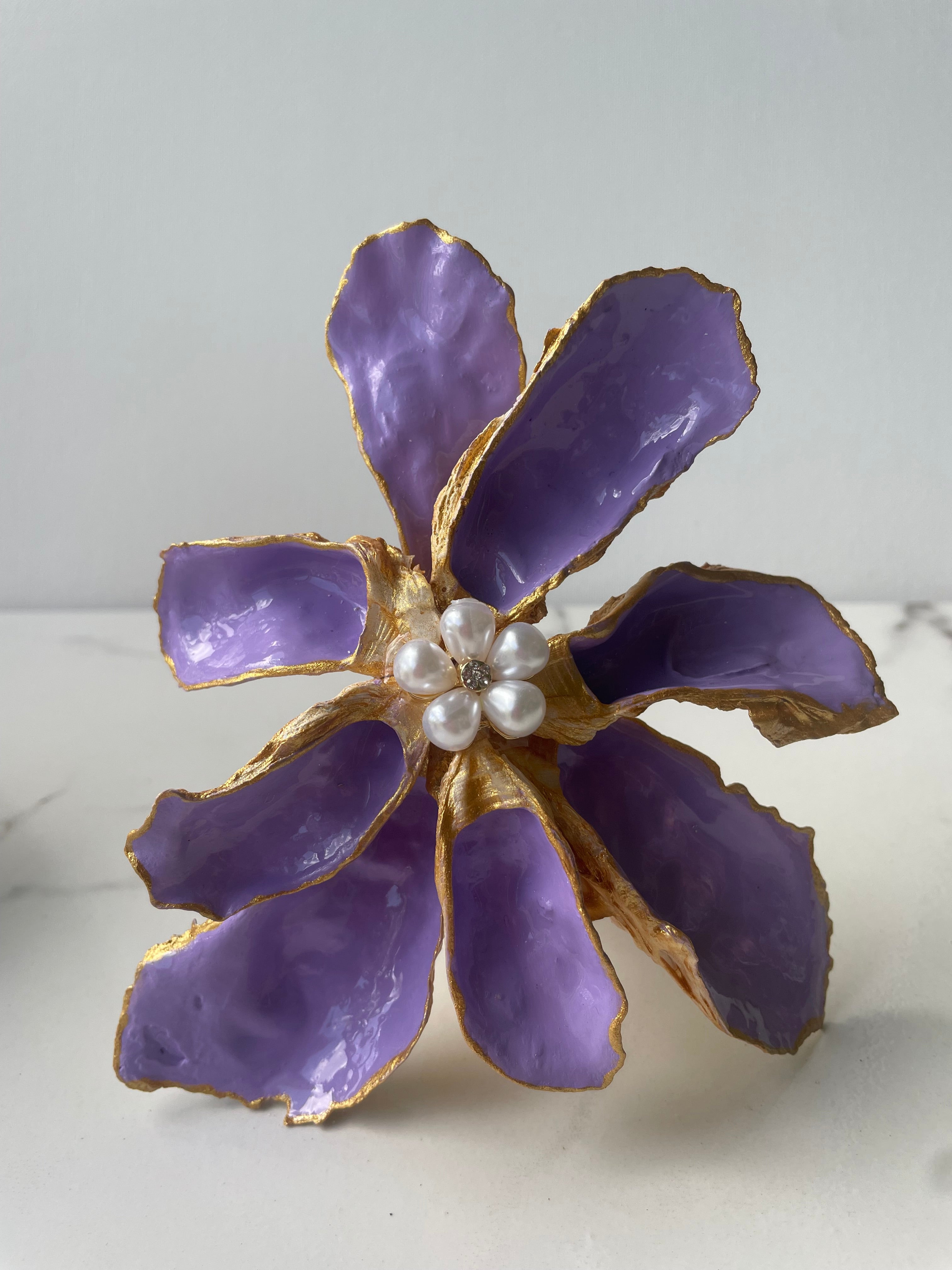 Gilded Iris Shell Flower sculpture #2 — unique hand-painted oyster shell iris with lavender petals, gold paint edges, and pearl accent by The Golden Shoreline