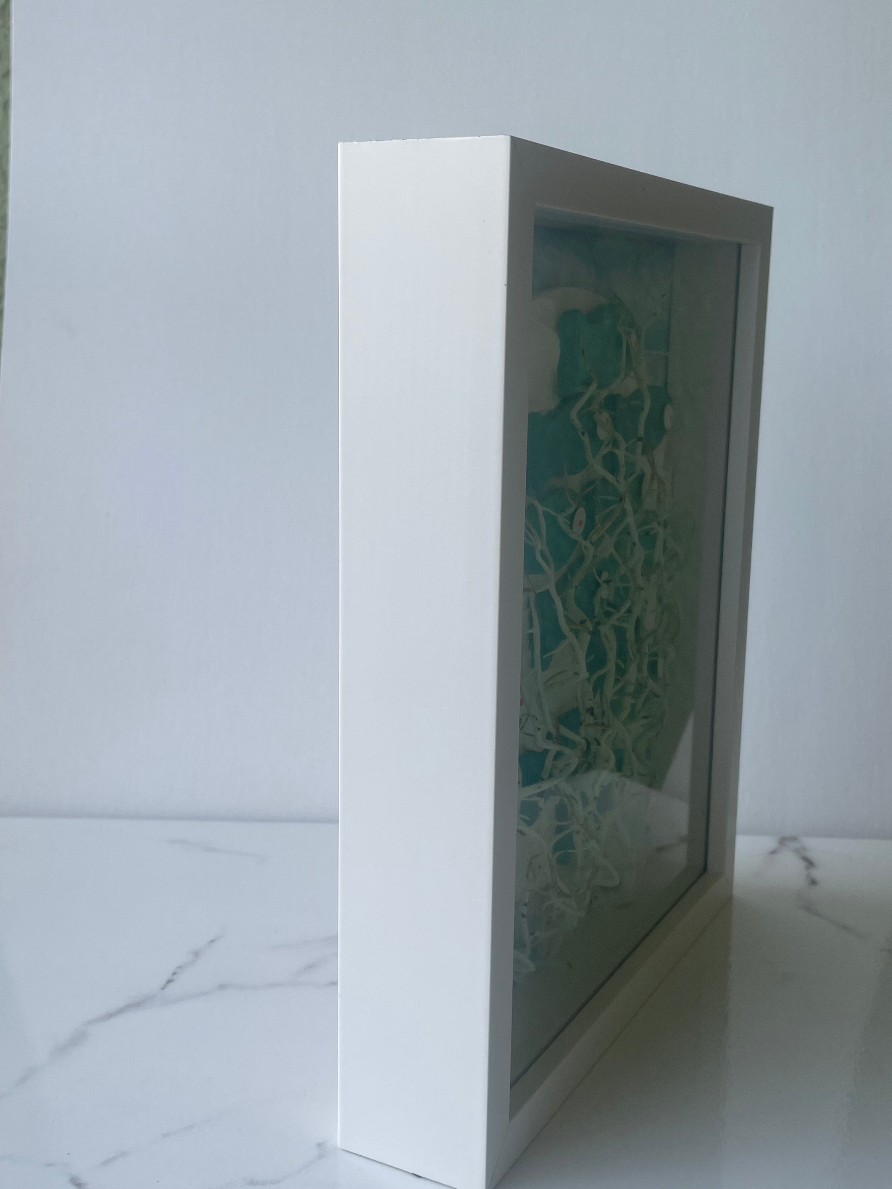 Side view of The Reef Reverie Shadow Box showing frame depth — handcrafted mixed media coastal art shadowbox by The Golden Shoreline